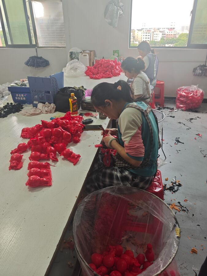 Manual trimming and finishing of PU toys